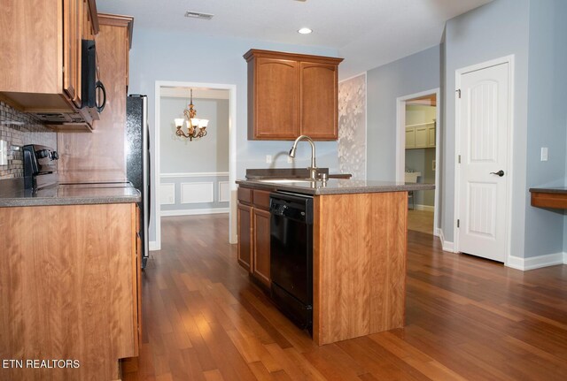 129 Mcneilly Cir, Maryville, TN 37803 - kitchen with dark wood-style floors, backsplash, black appliances, visible vents, and a sink