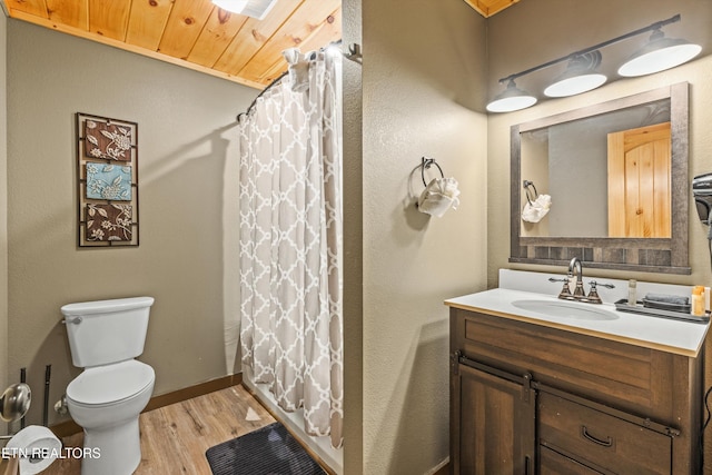 full bathroom with wooden ceiling, a shower with curtain, toilet, vanity, and wood finished floors