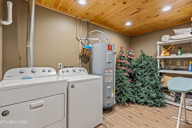 washroom featuring light wood-style flooring, recessed lighting, wood ceiling, electric water heater, and washer and clothes dryer