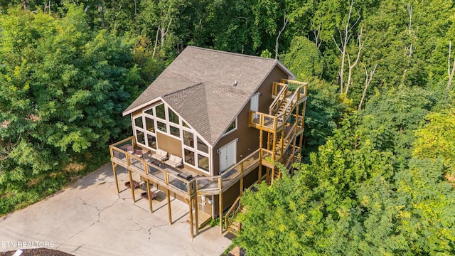 aerial view featuring a forest view