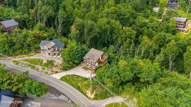bird's eye view with a forest view