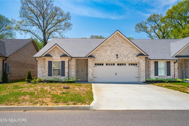 5925 Knox Hill Way, Knoxville, TN 37912 - ranch-style house featuring brick siding, roof with shingles, driveway, and a garage