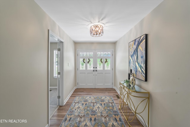 230 Briarcliff Ave, Oak Ridge, TN 37830 - doorway featuring french doors, baseboards, a chandelier, and wood finished floors
