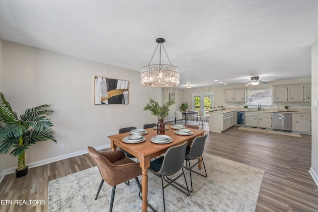 230 Briarcliff Ave, Oak Ridge, TN 37830 - dining space featuring baseboards, wood finished floors, ceiling fan with notable chandelier, french doors, and beverage cooler