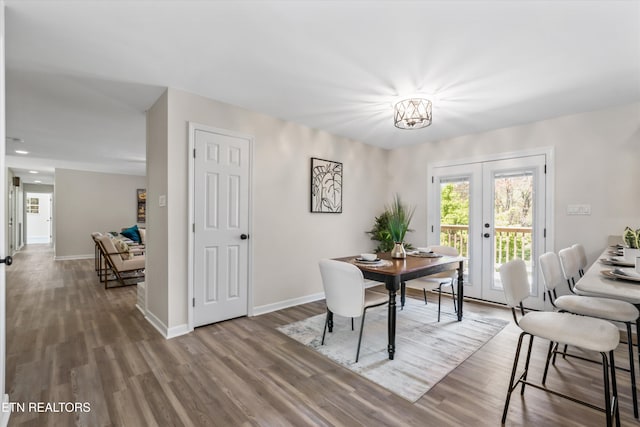230 Briarcliff Ave, Oak Ridge, TN 37830 - dining room featuring french doors, baseboards, and wood finished floors