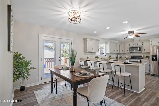 230 Briarcliff Ave, Oak Ridge, TN 37830 - dining space featuring recessed lighting, ceiling fan with notable chandelier, baseboards, and dark wood finished floors