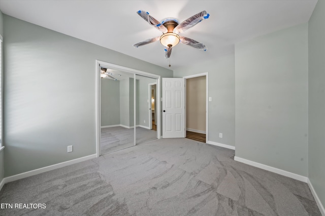 230 Briarcliff Ave, Oak Ridge, TN 37830 - unfurnished bedroom featuring a closet, carpet flooring, baseboards, and a ceiling fan