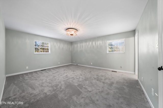 230 Briarcliff Ave, Oak Ridge, TN 37830 - carpeted spare room with baseboards