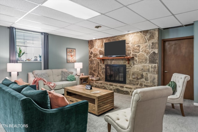 230 Briarcliff Ave, Oak Ridge, TN 37830 - carpeted living area featuring a fireplace, a paneled ceiling, and visible vents