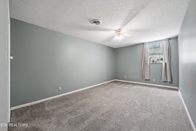 230 Briarcliff Ave, Oak Ridge, TN 37830 - carpeted empty room featuring visible vents, baseboards, a ceiling fan, and a textured ceiling