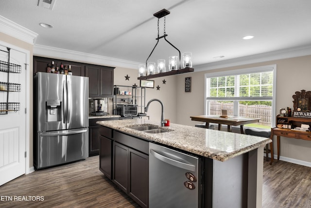 5811 Rain Cloud Rd, Knoxville, TN 37918 - kitchen with appliances with stainless steel finishes, crown molding, light stone counters, dark wood-style floors, and hanging light fixtures