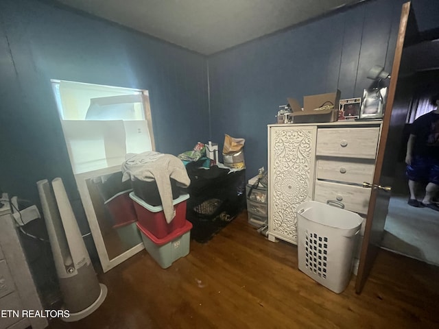 bedroom featuring wood finished floors