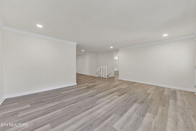 9204 Chamaeleon Trl, Harrison, TN 37341 - empty room featuring ornamental molding, baseboards, light wood-type flooring, and recessed lighting