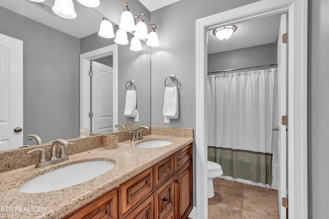 bathroom with a sink, toilet, double vanity, and a shower with curtain