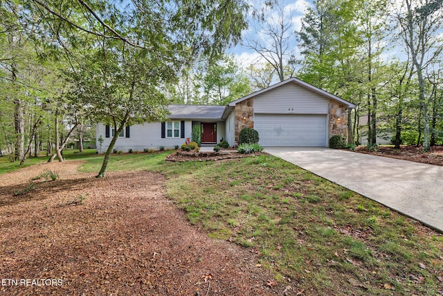 53 Inwood Ter, Crossville, TN 38558 - ranch-style home with concrete driveway, an attached garage, stone siding, and a front lawn
