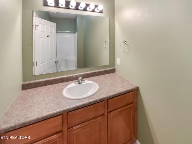 1056 Willow Creek Cir, Maryville, TN 37804 - bathroom featuring vanity and walk in shower
