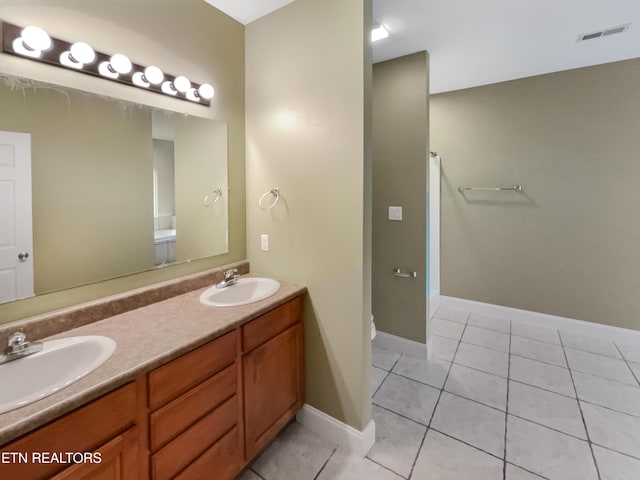 1056 Willow Creek Cir, Maryville, TN 37804 - bathroom featuring a sink, visible vents, walk in shower, and double vanity