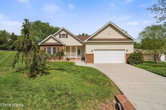 102 Chaloni Ln, Loudon, TN 37774 - craftsman-style home featuring brick siding, a front yard, an attached garage, and concrete driveway
