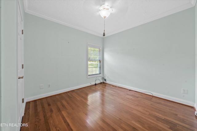 102 Chaloni Ln, Loudon, TN 37774 - empty room featuring baseboards, a textured ceiling, ornamental molding, and wood finished floors