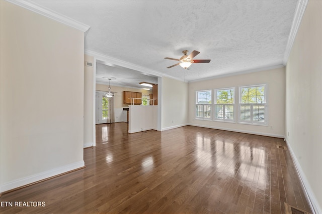 102 Chaloni Ln, Loudon, TN 37774 - unfurnished living room with dark wood-type flooring, ceiling fan, and plenty of natural light