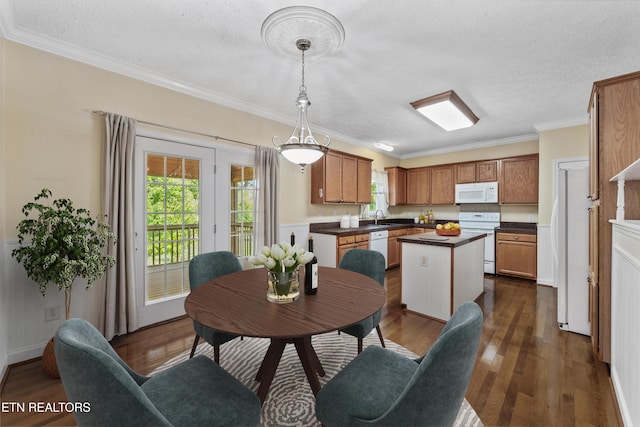 102 Chaloni Ln, Loudon, TN 37774 - kitchen with a center island, white appliances, a textured ceiling, and a sink