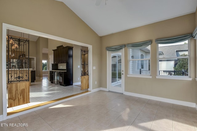 304 Coweta Ct, Loudon, TN 37774 - interior space with an inviting chandelier, light tile patterned floors, high vaulted ceiling, and baseboards