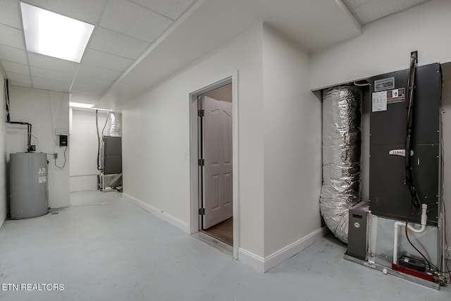 304 Coweta Ct, Loudon, TN 37774 - finished basement with a drop ceiling, electric water heater, heating unit, and baseboards
