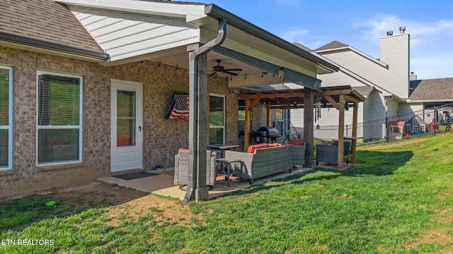 exterior space with an outdoor hangout area and ceiling fan