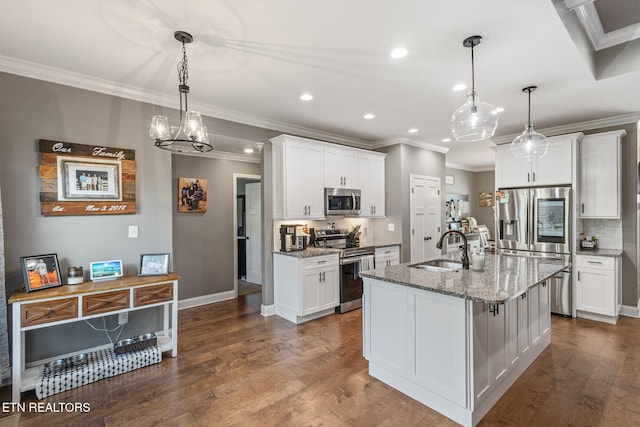 kitchen featuring a sink, appliances with stainless steel finishes, white cabinetry, and dark wood-style flooring