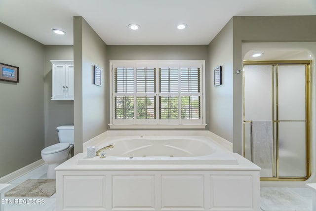 bathroom featuring baseboards, toilet, a shower stall, recessed lighting, and a jetted tub