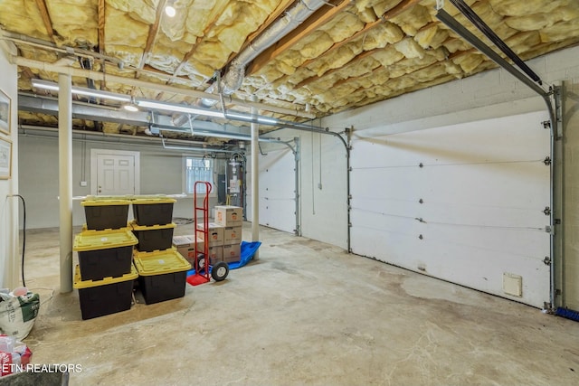 garage featuring water heater
