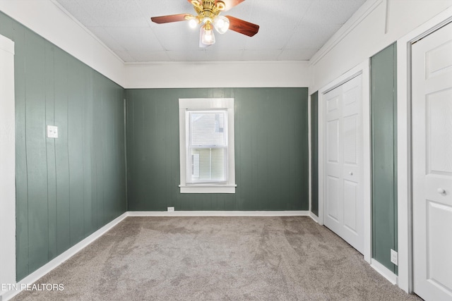 2214 Lincoln St, Knoxville, TN 37920 - unfurnished bedroom featuring a closet, baseboards, ceiling fan, and carpet
