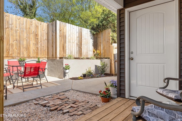 2214 Lincoln St, Knoxville, TN 37920 - doorway to property featuring a patio, outdoor dining area, and fence