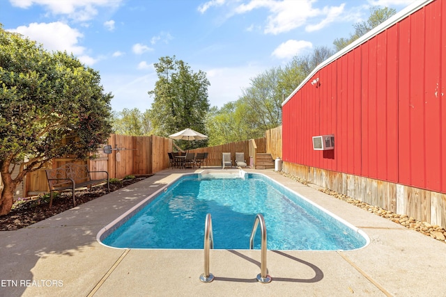 2214 Lincoln St, Knoxville, TN 37920 - view of swimming pool featuring outdoor dining space, a patio, a fenced in pool, a fenced backyard, and a wall unit AC