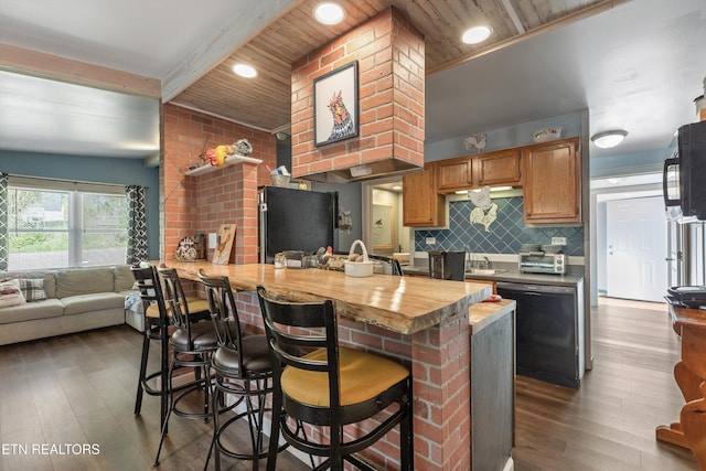 2214 Lincoln St, Knoxville, TN 37920 - kitchen with a breakfast bar, dark wood-style floors, backsplash, beam ceiling, and black appliances