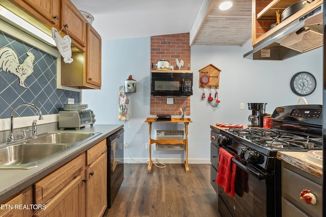 2214 Lincoln St, Knoxville, TN 37920 - kitchen with baseboards, a sink, dark wood finished floors, under cabinet range hood, and black appliances