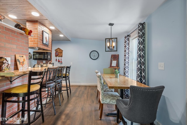 2214 Lincoln St, Knoxville, TN 37920 - dining area with a chandelier, recessed lighting, dark wood-style floors, and baseboards
