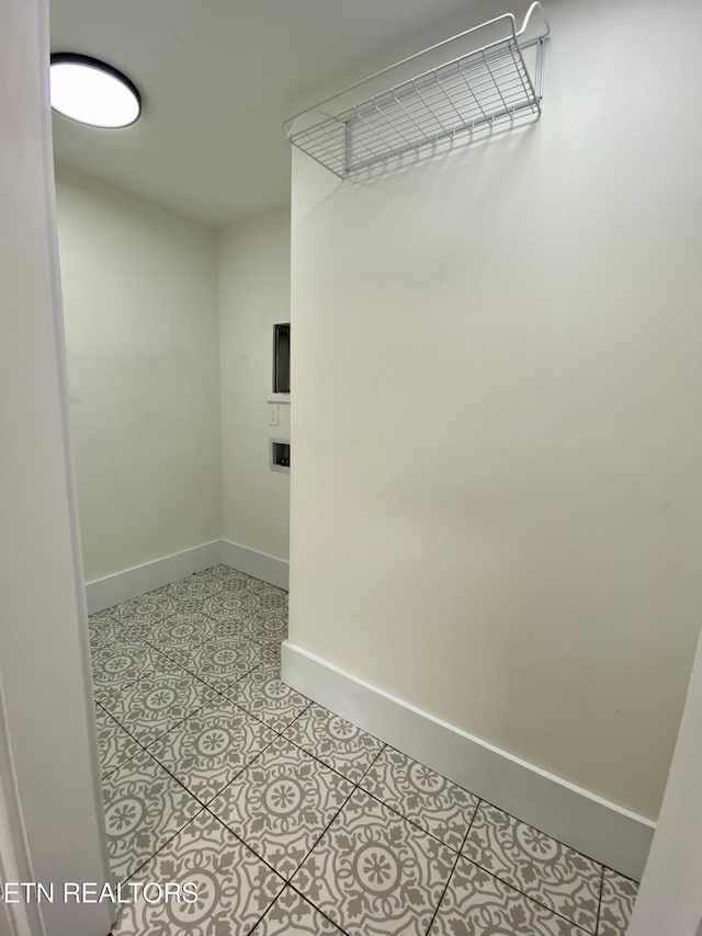 walk in closet featuring light tile patterned floors