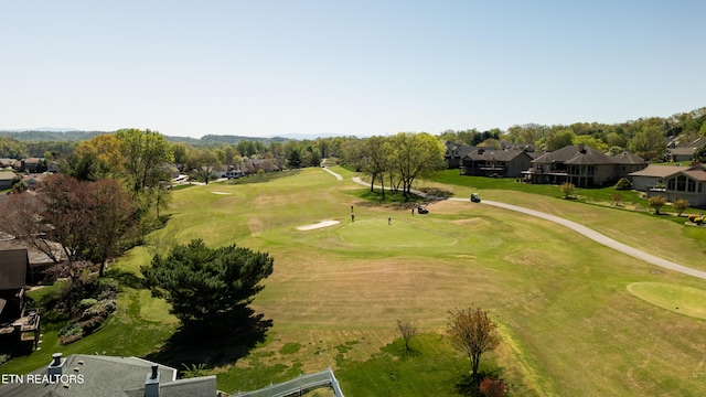 birds eye view of property with golf course view
