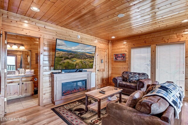 906 Black Bear Cub Way, Sevierville, TN 37862 - living area with recessed lighting, wooden walls, light wood-style flooring, and wood ceiling