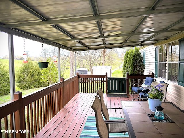 deck featuring an outbuilding