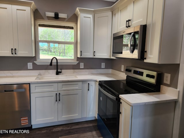 180 W Park Cir, Decatur, TN 37322 - kitchen featuring white cabinetry, a sink, and appliances with stainless steel finishes
