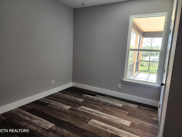 180 W Park Cir, Decatur, TN 37322 - empty room featuring dark wood-type flooring and baseboards