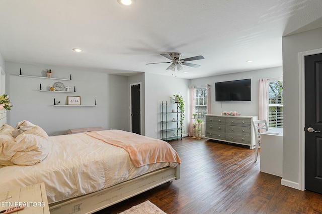 bedroom with recessed lighting, dark wood-style flooring, and ceiling fan
