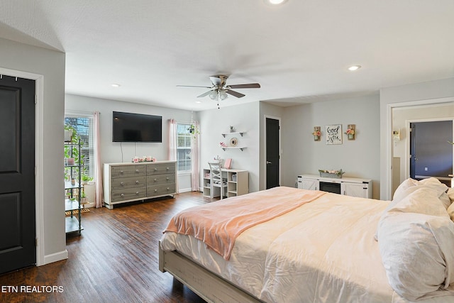 bedroom featuring recessed lighting, dark wood-style flooring, and baseboards
