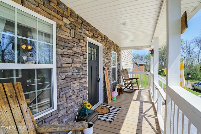 wooden deck with a porch