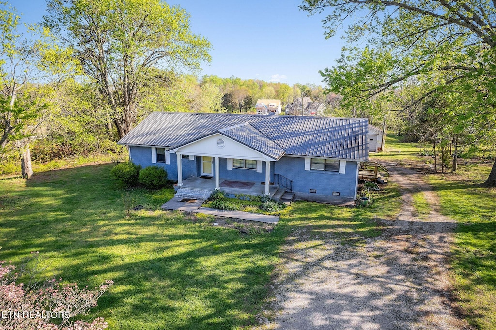 920 Buffalo Valley Rd, Cookeville, TN 38501 - view of front of home with a front lawn, driveway, and a porch