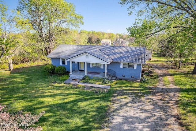 920 Buffalo Valley Rd, Cookeville, TN 38501 - view of front of home with a front lawn, driveway, and a porch