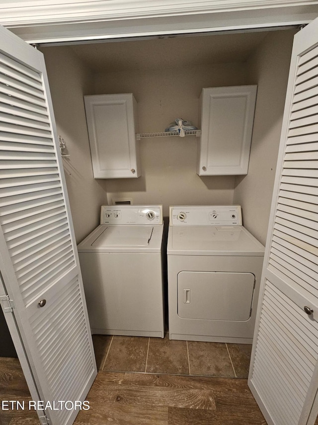 laundry area featuring cabinet space and washing machine and dryer