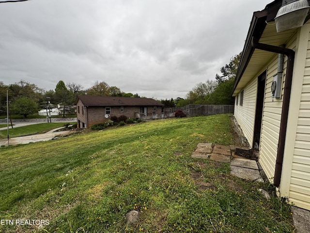 view of yard with fence